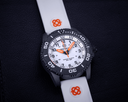 DayNight 43 Solar — Black/White White Orange Blue Strap