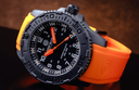 Daynight 43mm Diver Solar Powered PC Tritium Watch- Stealth Bezel - Black Dial - White Numbers - Orange Hands 2 Color Tr