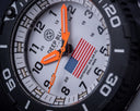 DayNight 43 Solar — Black/White White Flag Orange Strap