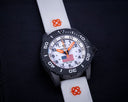 DayNight 43 Solar — Black/White White Flag Orange Strap