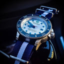 Juggernaut IV USA Swiss Automatic – Diver #6 White/blue Bezel - White Dial Strap