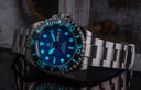 Master 2000 Day Date Swiss Auto Blue Ombre Dial Round Hour Markers Black Hands
