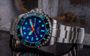 Master 2000 Day Date Swiss Auto Blue Ombre Dial Round Hour Markers Orange Hands