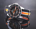 Speedograph 1000 Collection Black Ceramic Bezel - Black/orange Checkered Dial Strap
